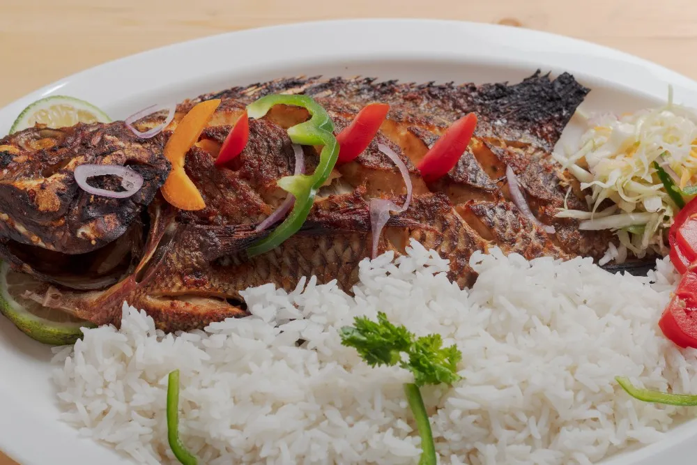 Elegant signature grilled fish dining experience at 7Days Motel